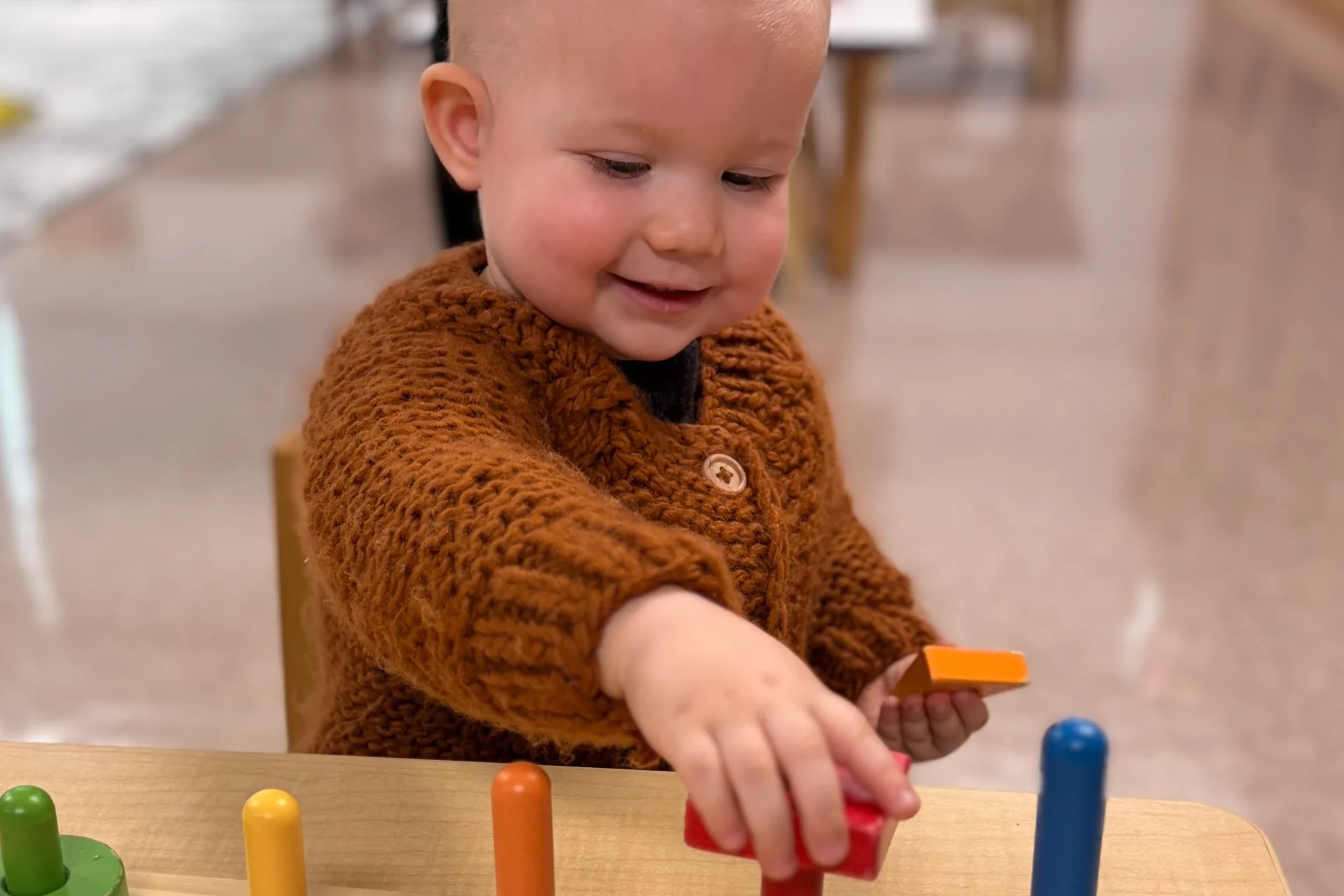 toddler baby learning at his preschool